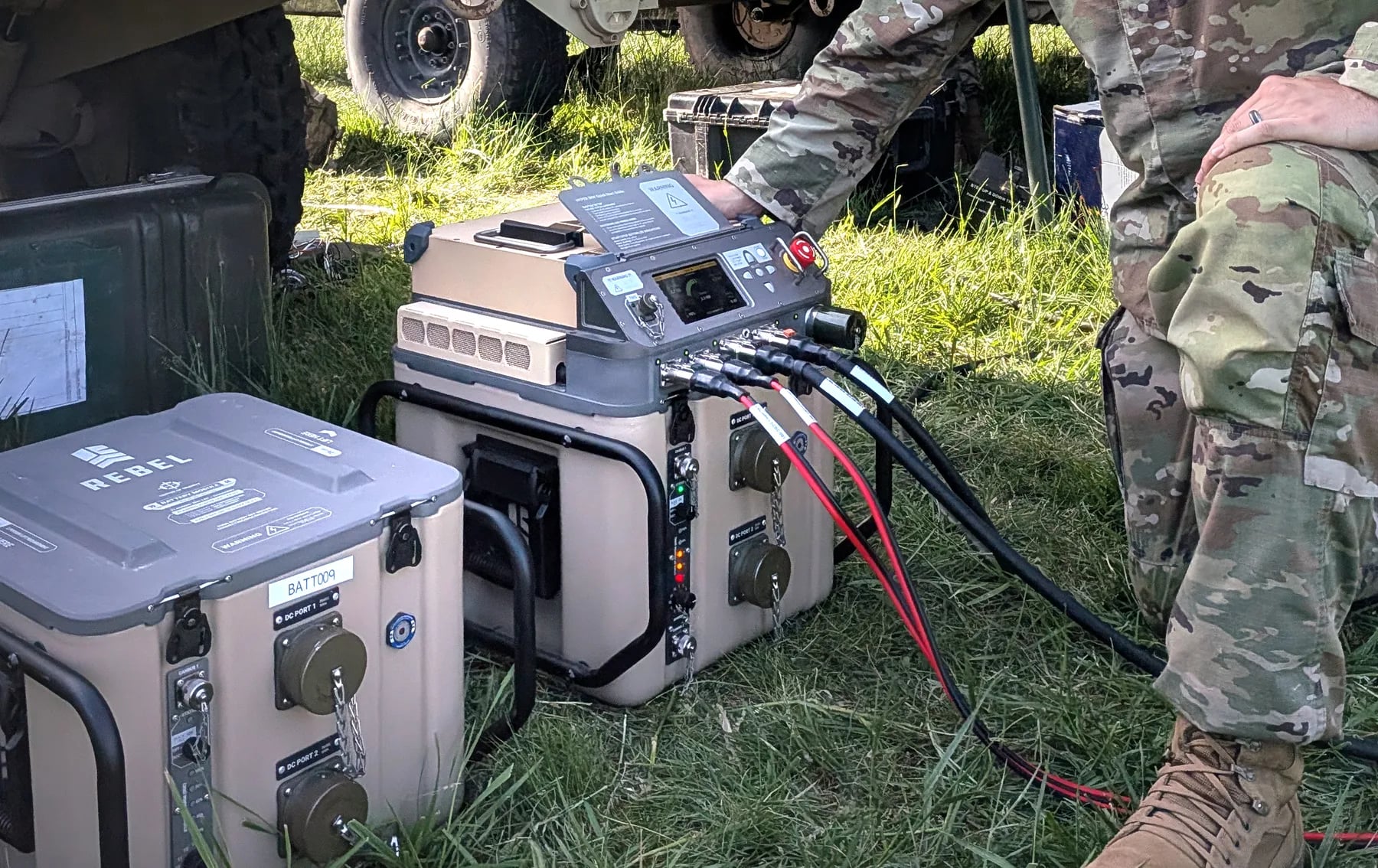 Soldier operating HYPER™ power and battery module units in the field