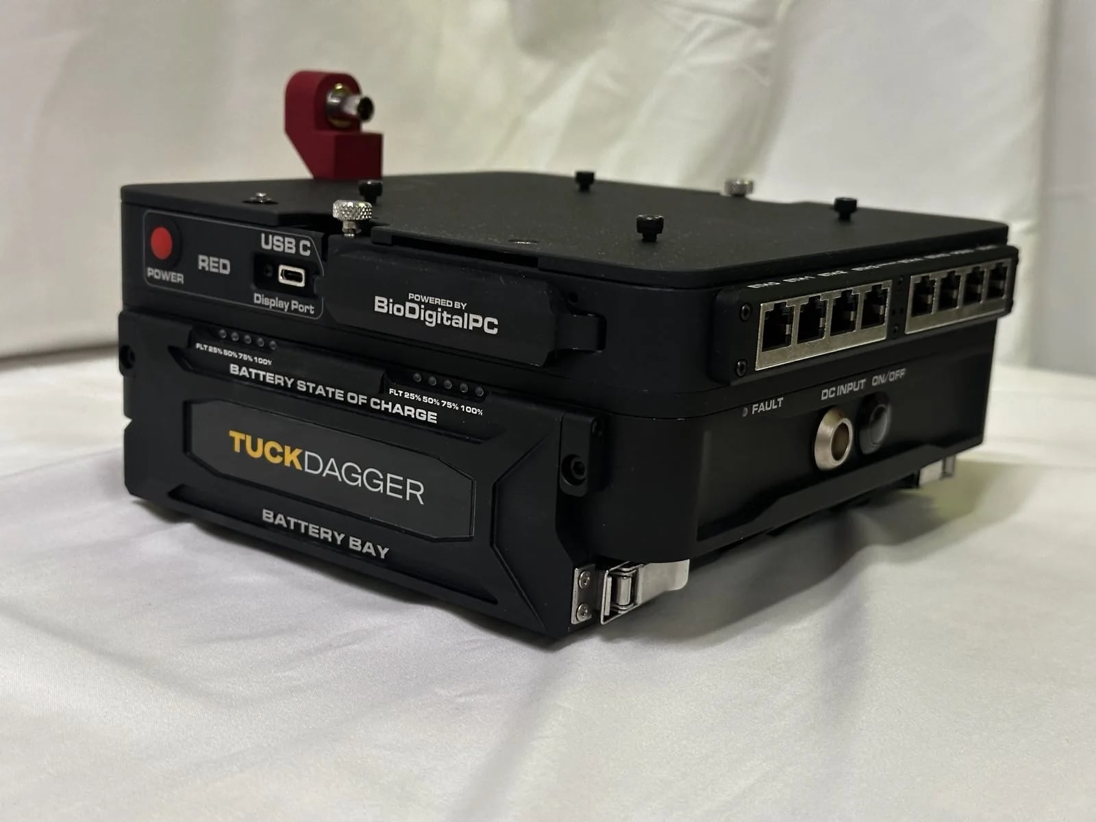 Three-quarter side photograph of the TUCK™ DAGGER communications system